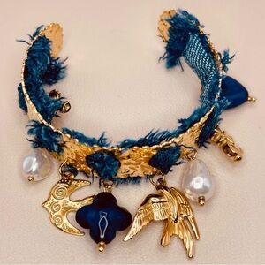 Gold and Denim Textile Dangling Charm Bracelet with Seagull and Pearls